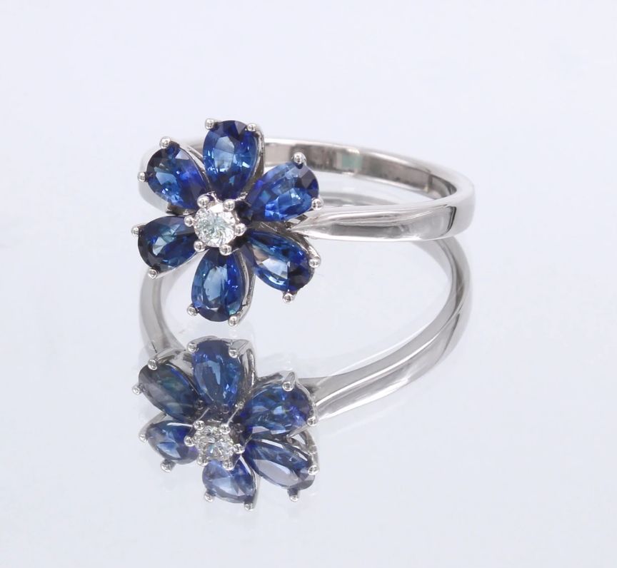 9ct White Gold Blue Sapphire Flower Ring with Diamond Centre (1.38ct)