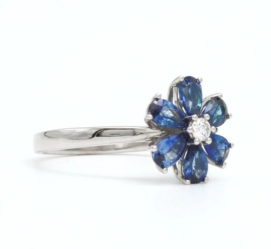 9ct White Gold Blue Sapphire Flower Ring with Diamond Centre I 0.06ct Diamond & 1.32ct Sapphire total